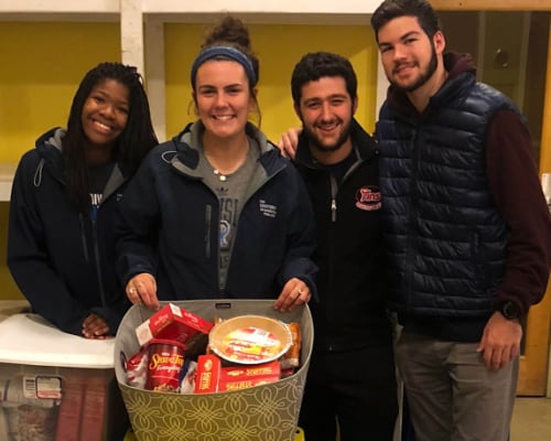 Students collect food for a charity drive