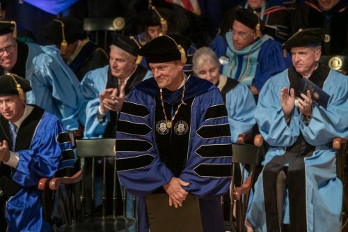 President Parlange after receiving the URI Presidential Medallion