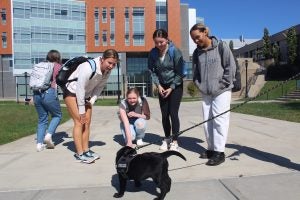 Basil draws a crowd of students whenever she's out and about on campus.