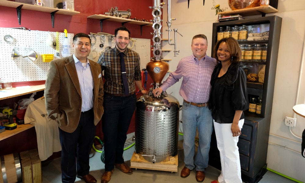 The White Dog Distillery team, who worked with the Rhode Island Small Business Development Corporation