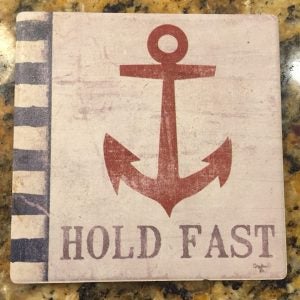 Photo of anchor design with slogan "hold fast".