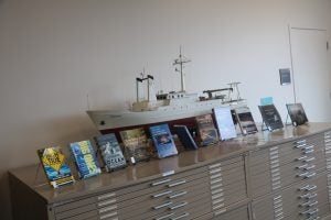 New books and model of R/V Endeavor in Pell Library