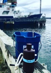 Photo shows that Tank 98 data is sampled with a bucket, from the GSO dock.