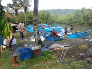 Fish Right will work closely with coastal communities—like these artisanal fishermen—to improve livelihoods by building sustainable fisheries. Photo courtesy of CRC.
