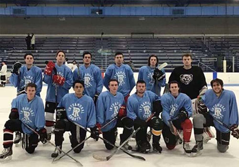 Intramural Sports hockey team posing in a group in the Boss Ice Arena
